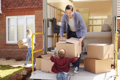 Staff organizing packing during office removals in Watford