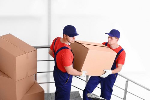 Moving day preparation with labeled boxes in a Watford house