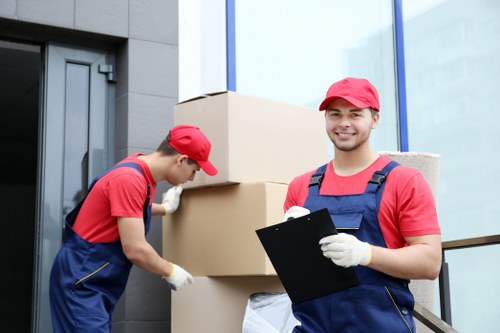 Moving van and organised household items during a Watford home move