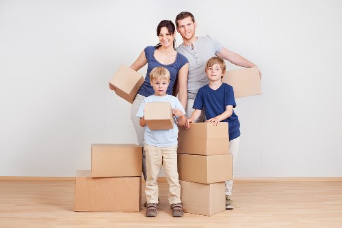 Local Watford relocation scene with house and moving van
