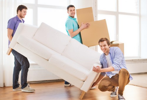 Packed boxes and furniture ready for transport in Watford
