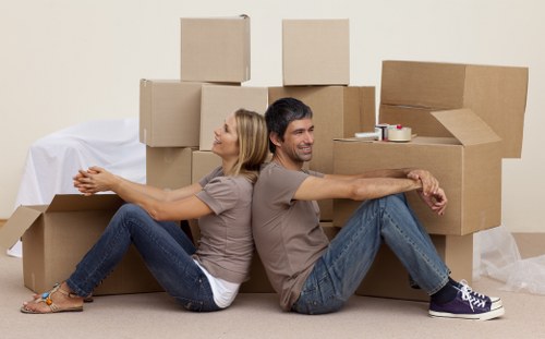 Careful loading of office equipment for a commercial move in Watford