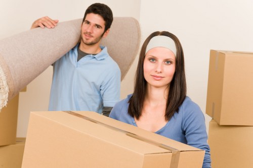 Loading furniture into a van for a local Watford delivery