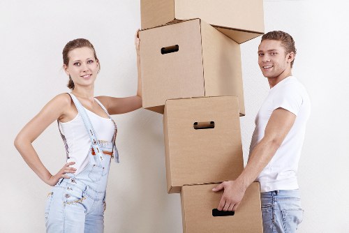 Removal van loading household items for a Watford move