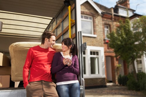 Piano movers positioning an instrument safely in a Watford home